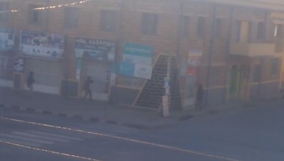 Eritrean soldiers breaking into a building in AdiGrat
